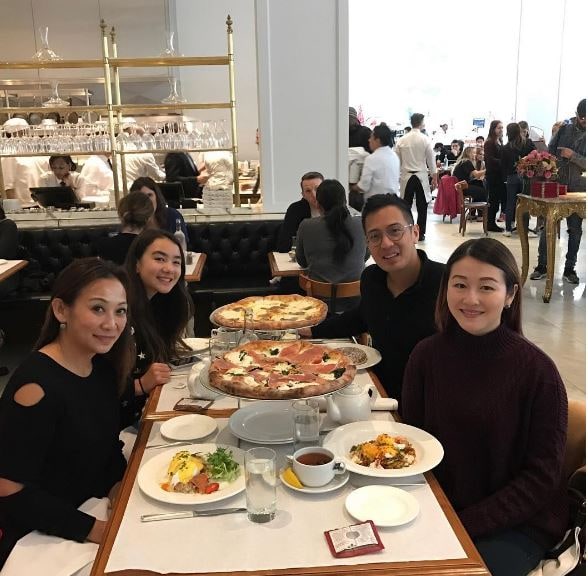 Open shoulder sweater with burrata pizza