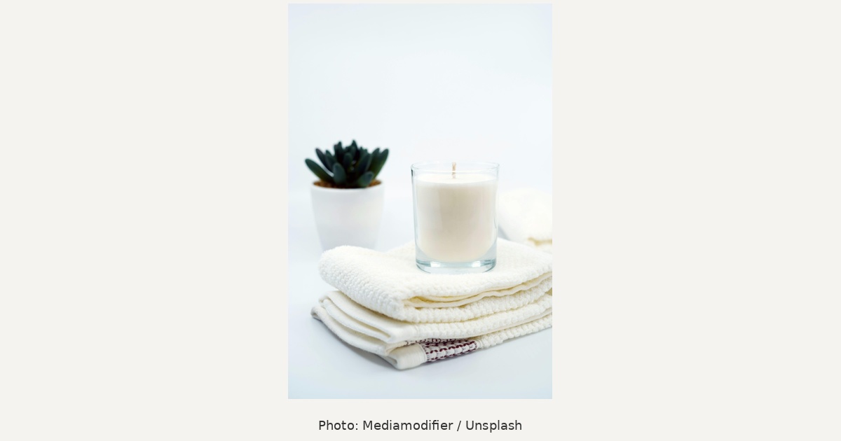 Candle and folded towels, self-care illustration
