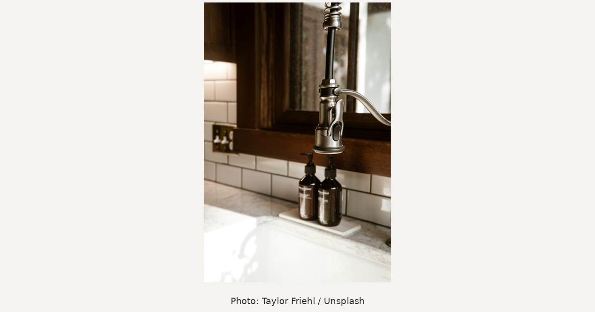 Bathroom sink and amber dispensers, skincare routine illustration