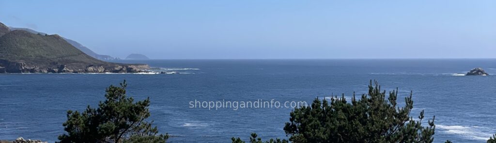 Big Sur coastline and blue ocean, with coastal cliffs and trees