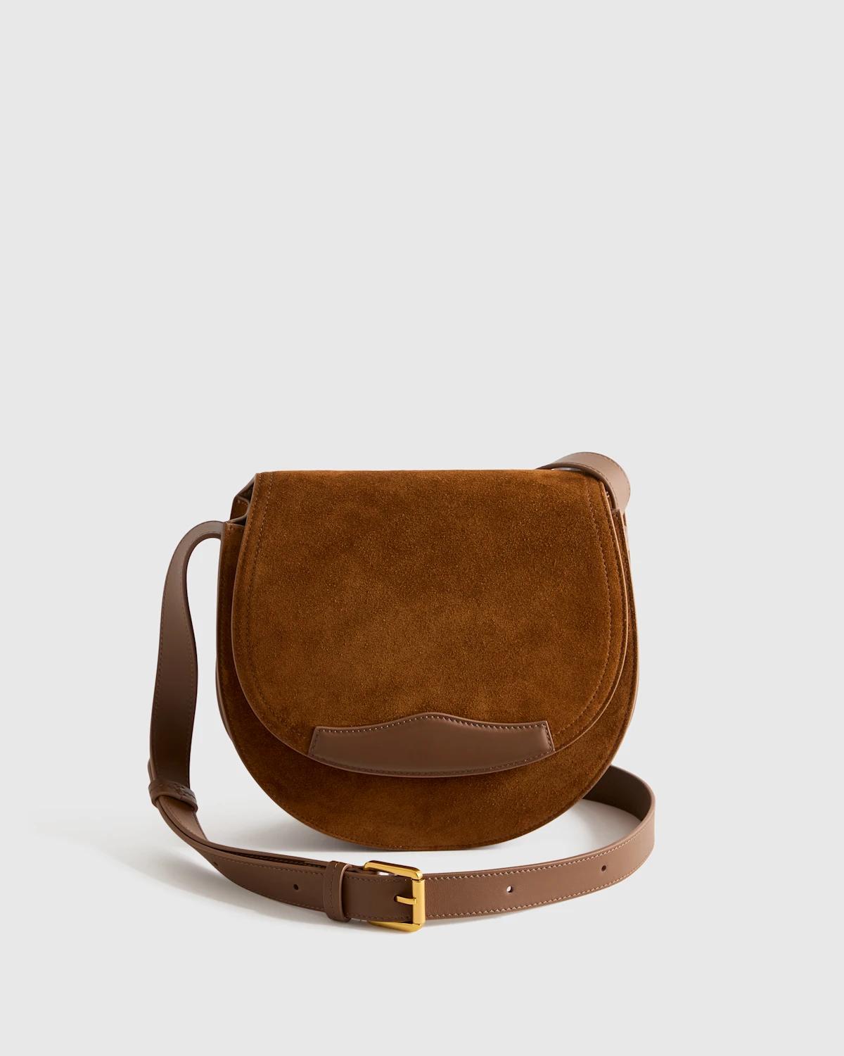 the whiskey suede saddle bag