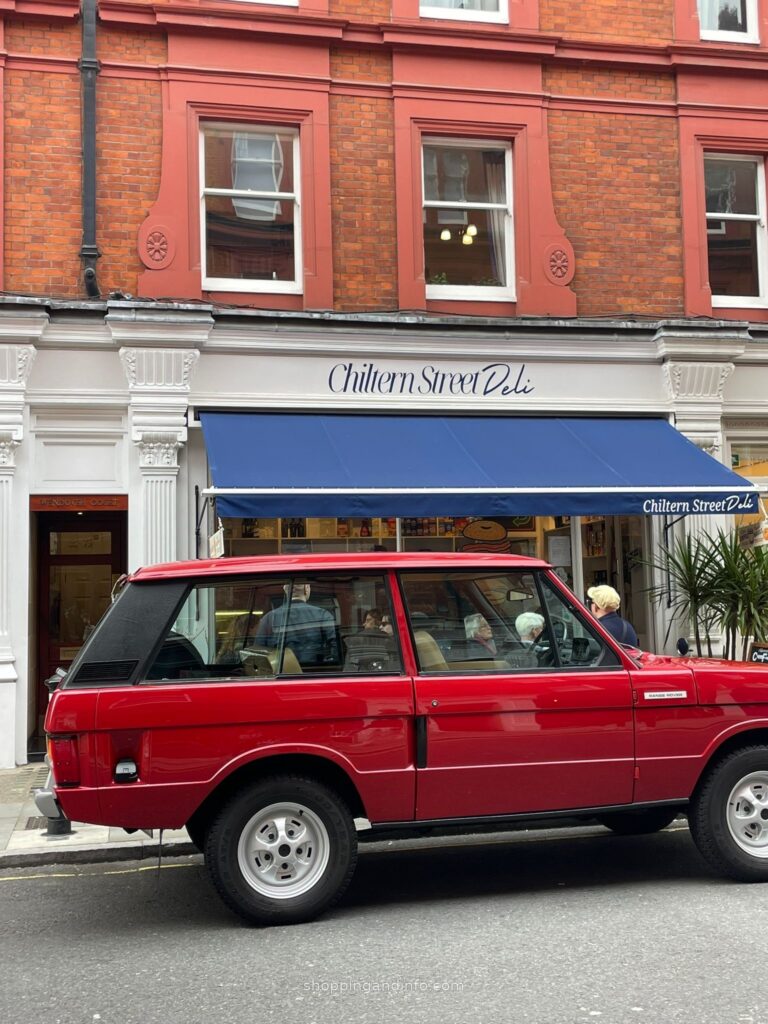 Red Range Rover outside Chiltern Street Deli in London - modern Sloane Ranger style