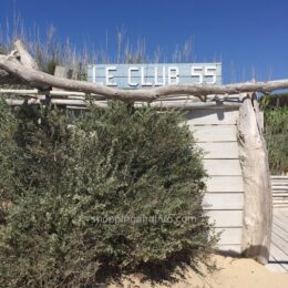 Le Club 55 sign at the beach entrance in St-Tropez