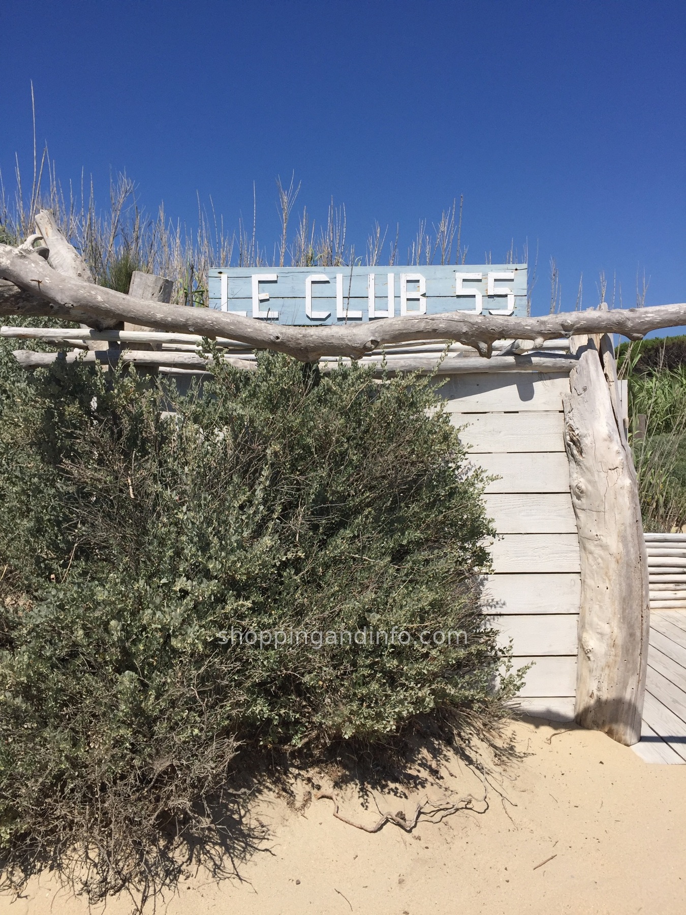 Club 55 driftwood sign