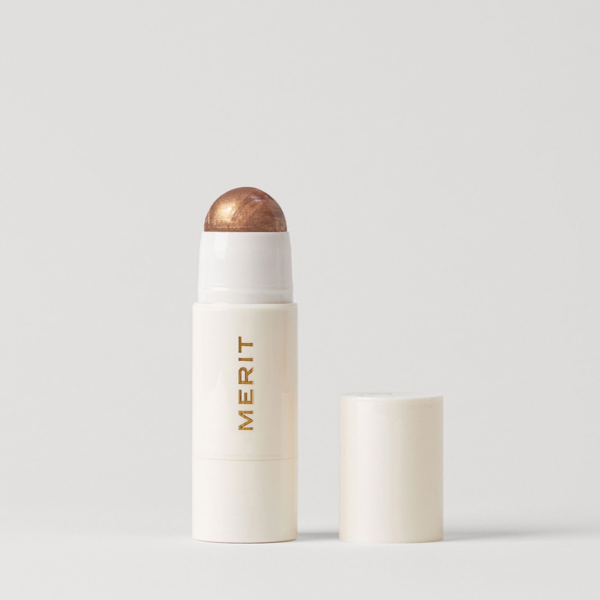 Merit Day Glow highlighting balm in Solstice