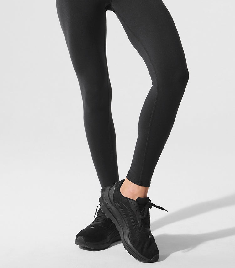 Black Alo 7/8 High-Waist Airbrush Leggings with sneakers, cropped product detail