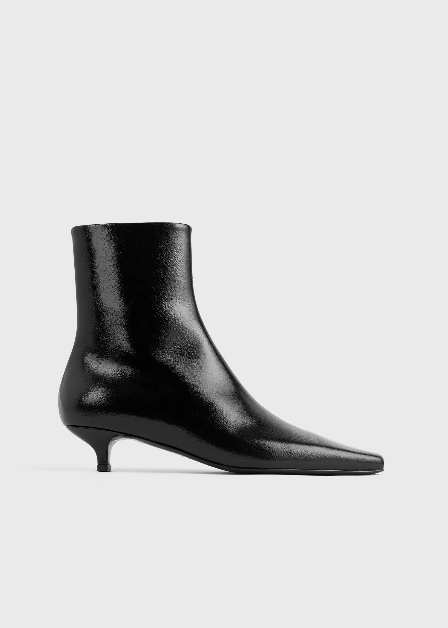 Ankle boots for women: Toteme Slim Naplack patent ankle boots in Black