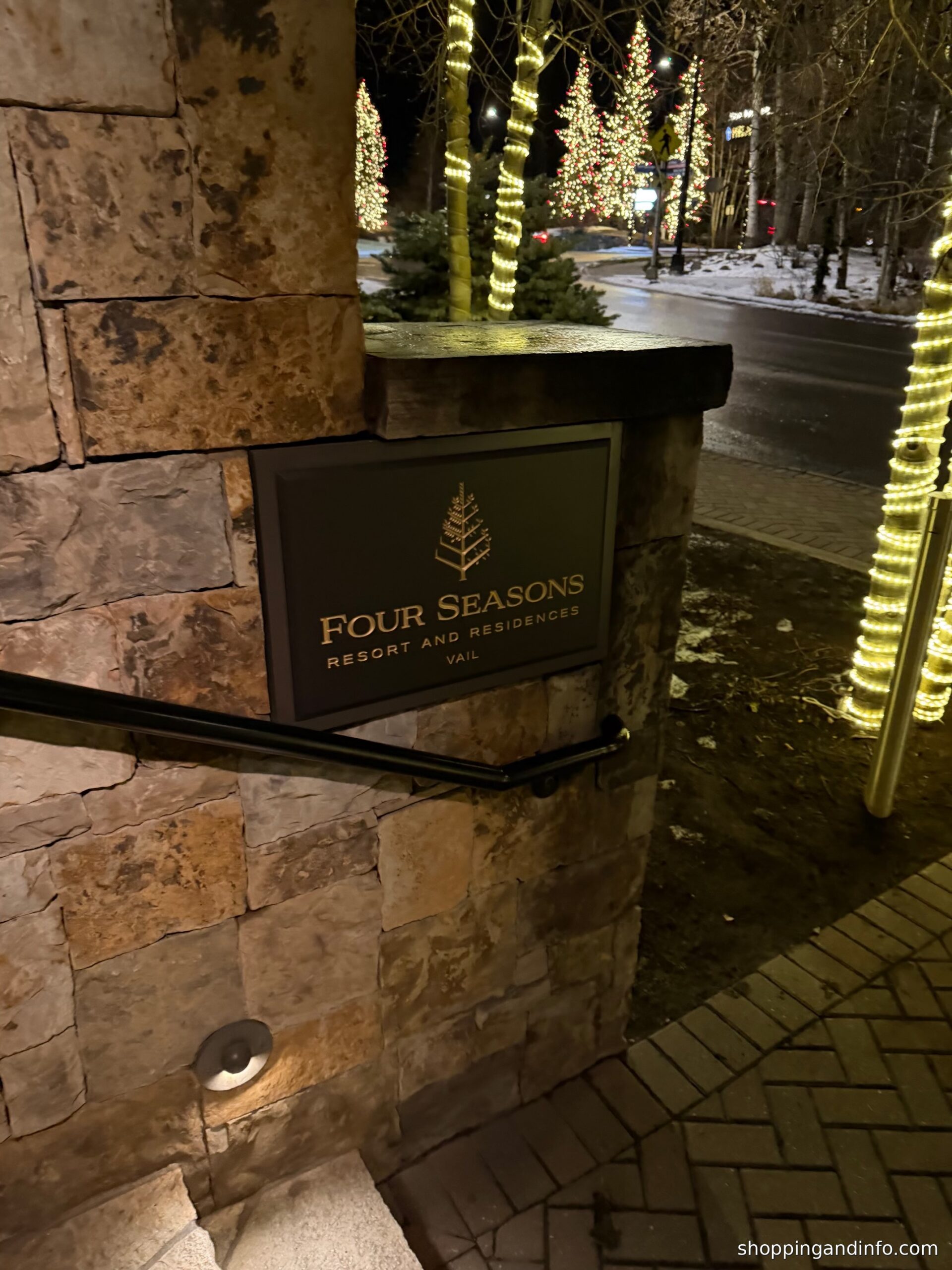 Vail Village: Four Seasons sign and illuminated trees at night