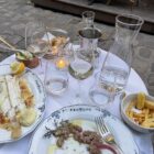 Date night outfits: dinner table for two with wine and candlelight at Le Procope in Paris