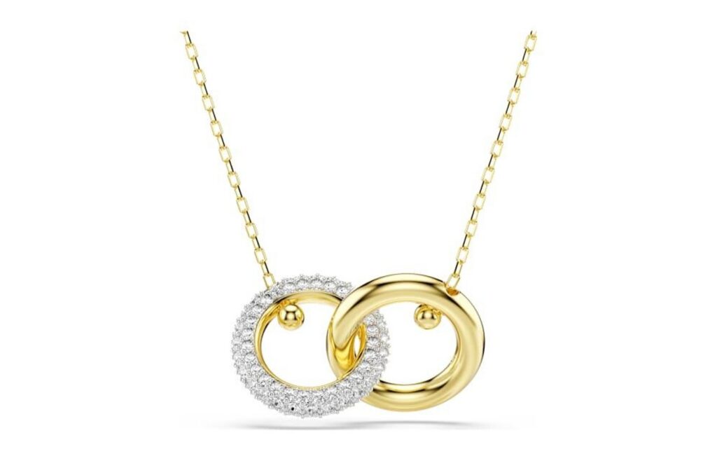 Swarovski Dextera gold pendant - Rebecca Falcone outfits