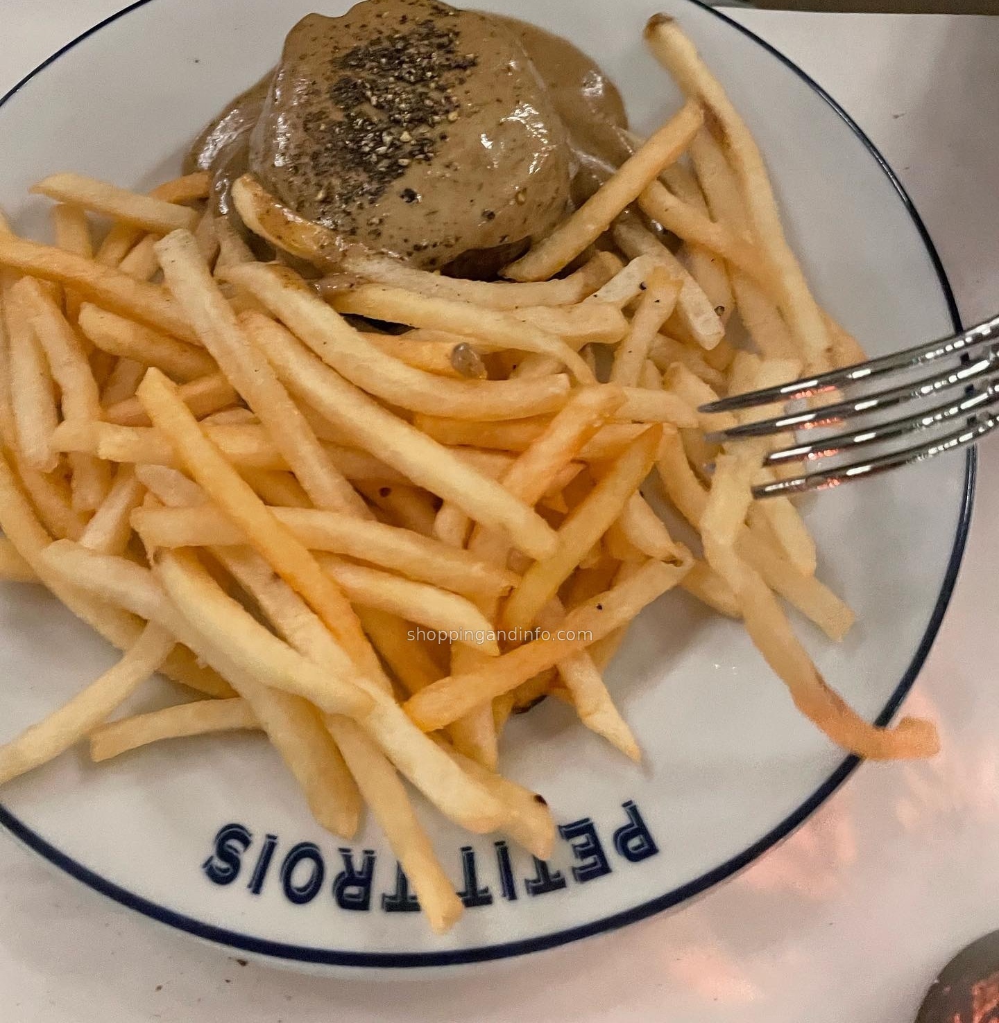 Steak with pepper sauce and fries at Petit Trois Le Valley