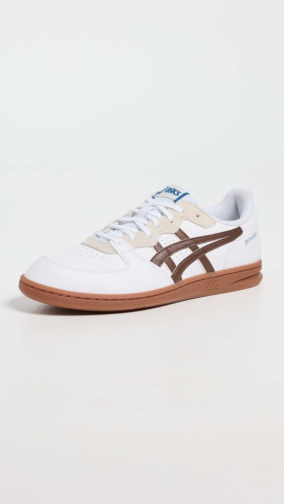 Low-profile sneakers with trousers: ASICS Skyhand OG sneakers in White/Mahogany