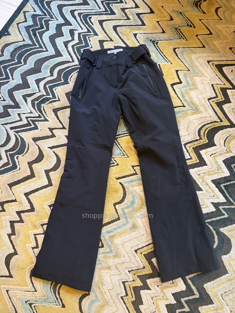 My black Capranea ski pants with an adjustable waistband and flared lower legs