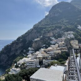 Positano coast viewed from a terrace with a railing