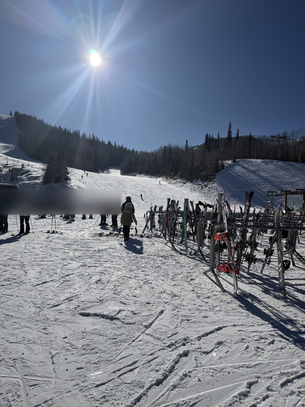 Ski racks beside the snowy slopes