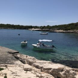 Clear water and moored boats in Croatia