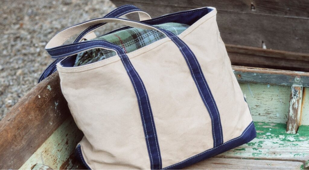 Navy L.L.Bean Boat and Tote styled with plaid for fall