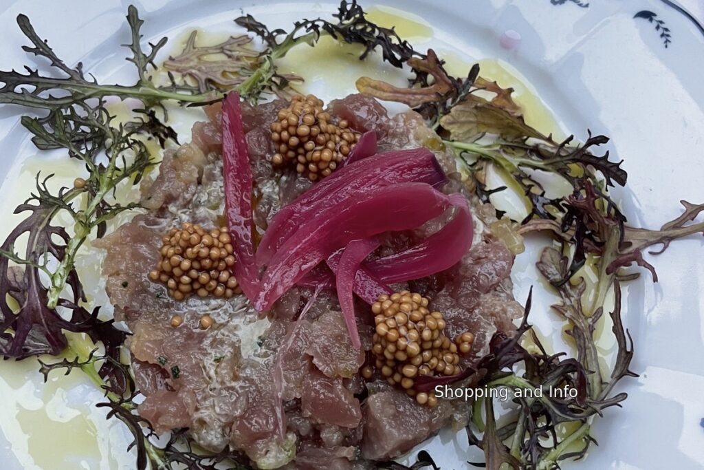 Le Procope dish with pink onions, mustard seeds and greens from our Paris meal