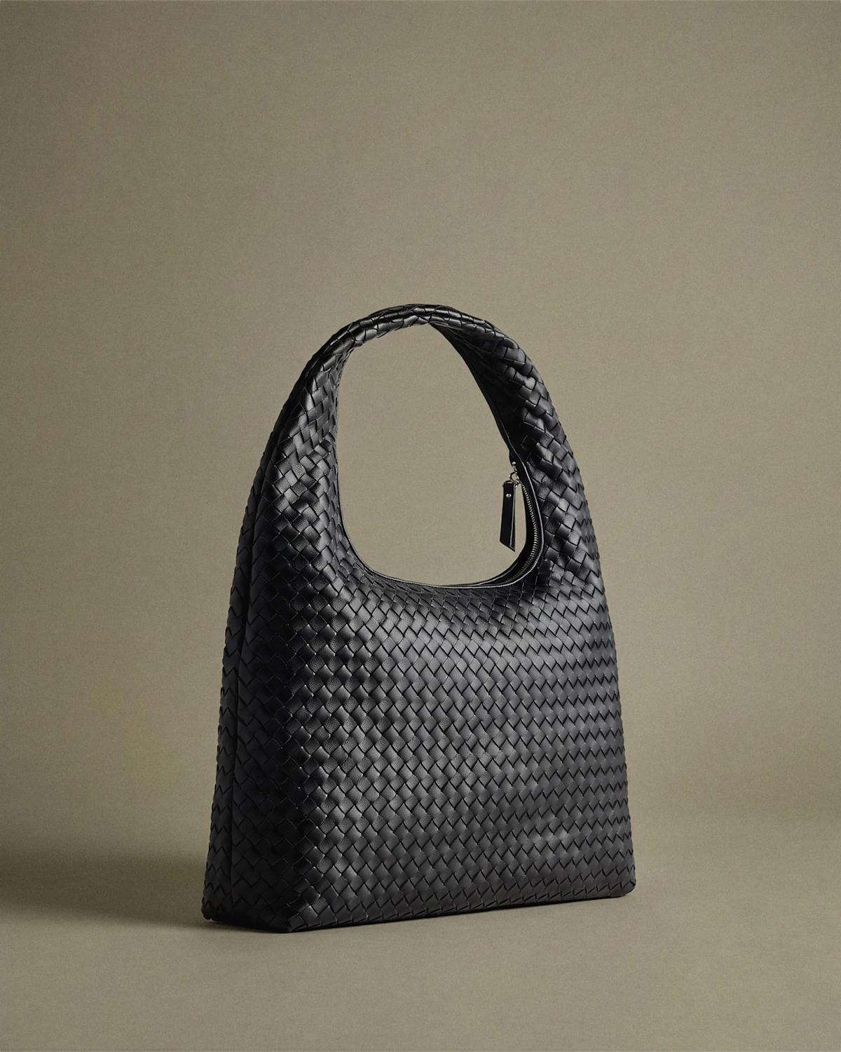 the black Elodie woven shoulder bag