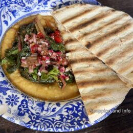 Kinneuchar Inn starter with grilled bread and greens on a blue-and-white plate in Fife, Scotland