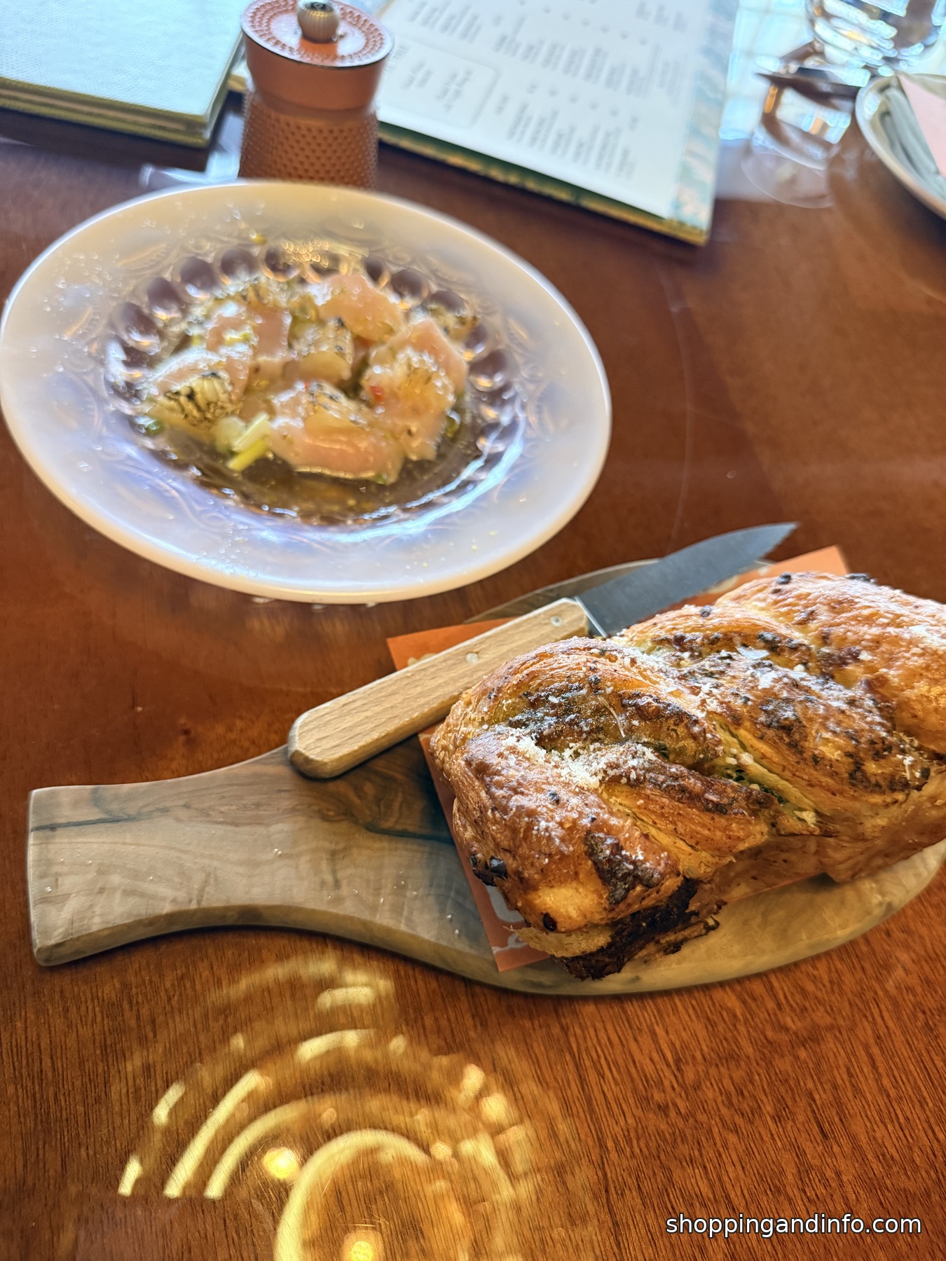 Bread and crudo at Bad Roman, second angle