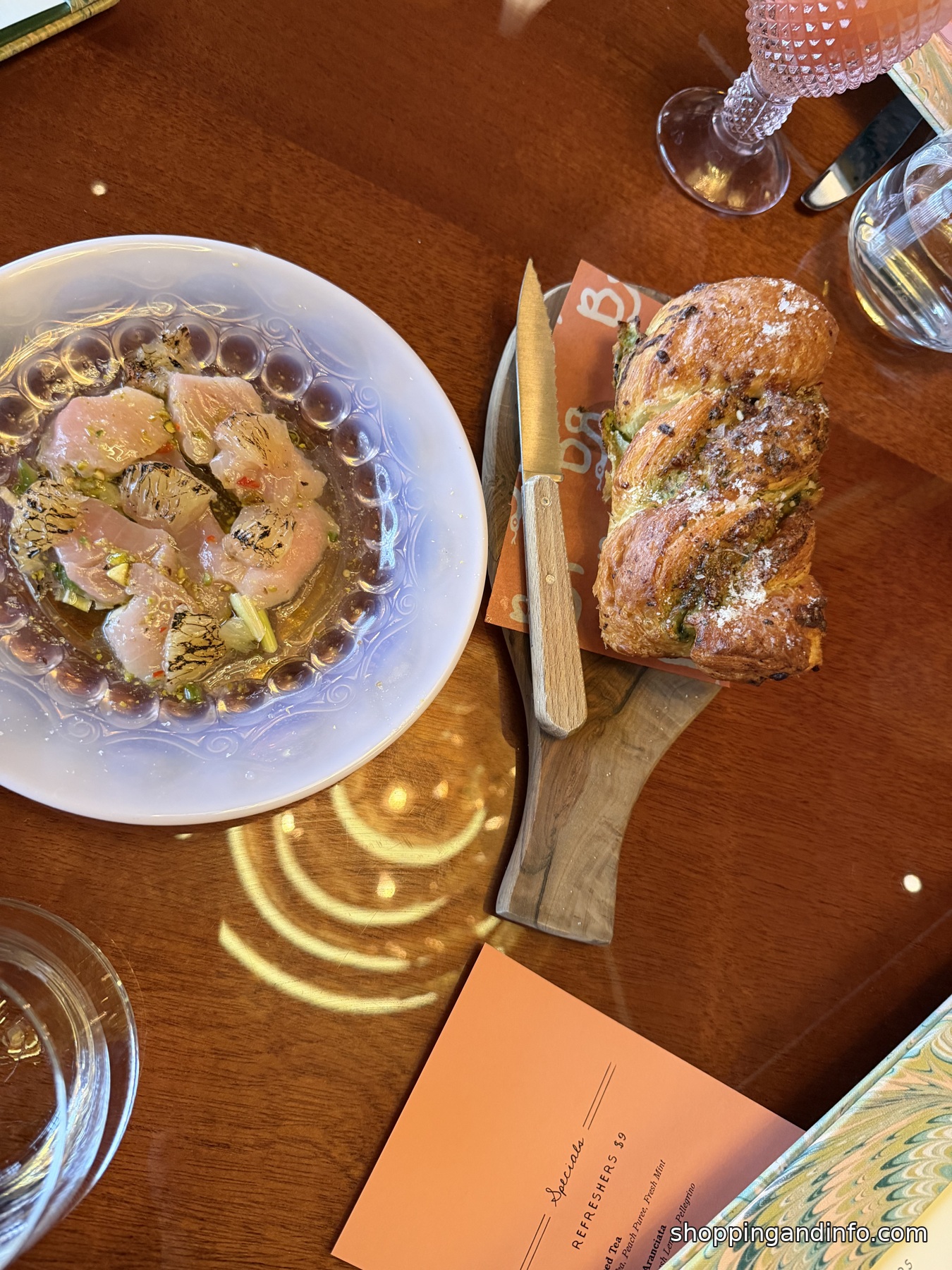 Garlic bread and crudo at Bad Roman
