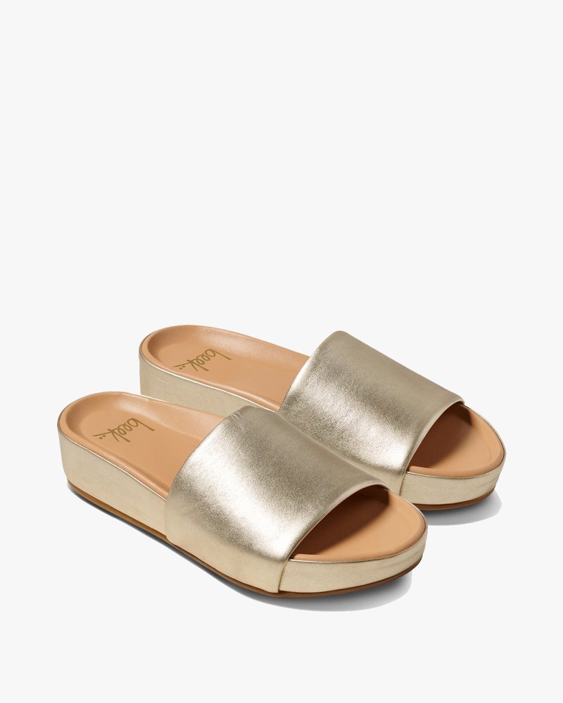 beek Pelican slides in platinum product photo - How to Dress for a Wedding in Mexico