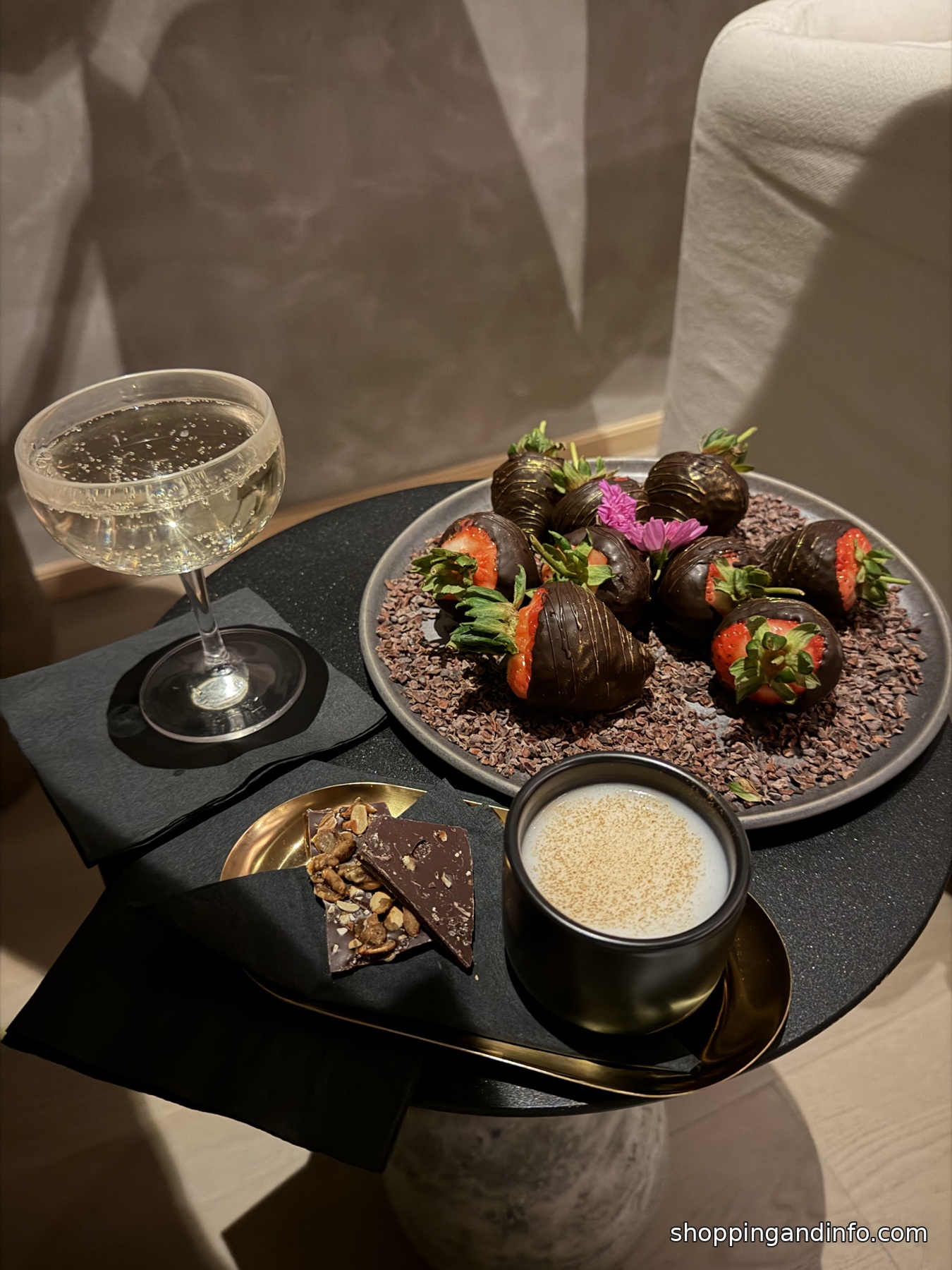 Champagne and chocolate covered strawberries close up at Fairmont Spa