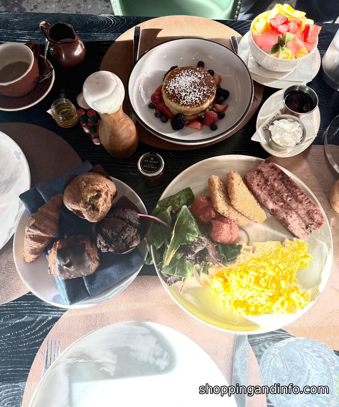 Pancakes, pastries and eggs on the breakfast table at the St. Regis Aspen Pancakes, pastries and eggs on the breakfast table at the St. Regis Aspen